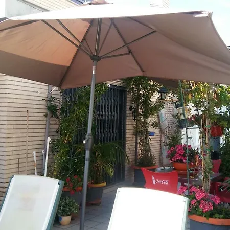 Familiar En Un Atico Con Gran Terraza Y,cocina ,en La Playa *
