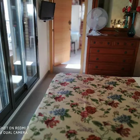 Familiar En Un Atico Con Gran Terraza Y,cocina ,en La Playa Homestay